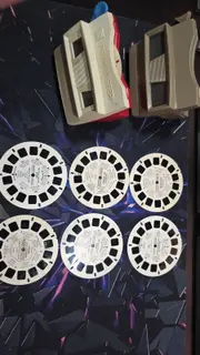 Vintage View-Master lot with 2 viewers and 7 reels.