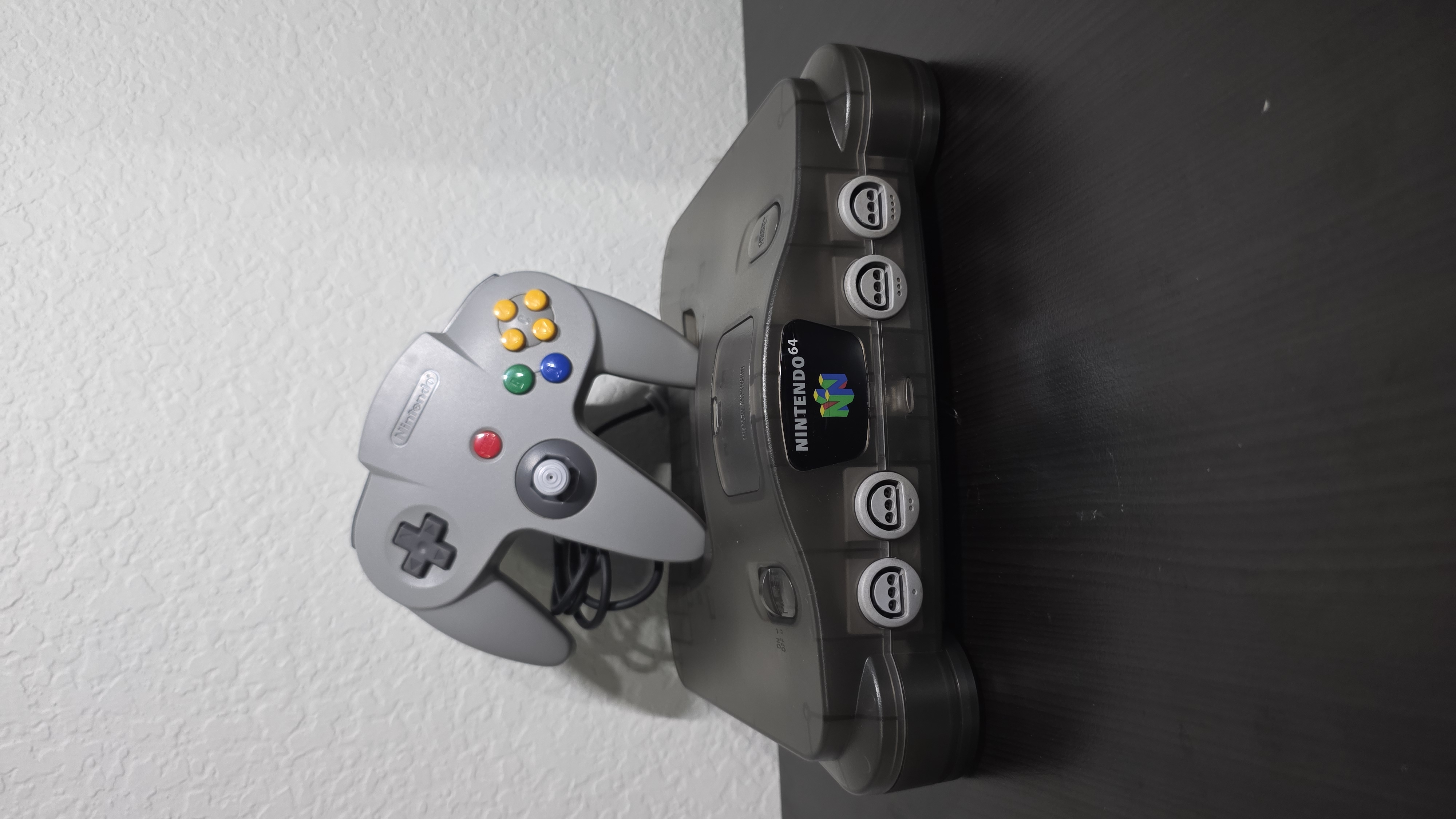 Nintendo 64 Translucent Gray Reshell w/ Gray Controller — photo 1 of 22